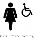 Silueta de mujer y persona en silla de ruedas en negro con fondo blanco, en relieve y braille