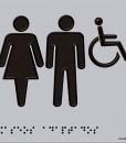 Siluetas de mujer, hombre y persona en silla de ruedas en negro con fondo gris, en relieve y braille