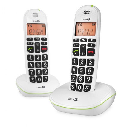 Dos teléfonos en color blanco encima de la base con teclas grandes